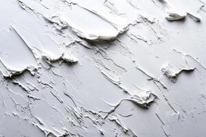White Paint Strokes on a Canvas Surface photo