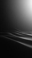 Abstract Black Fabric with Smooth Waves and Gradient Lighting photo