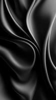 Abstract Draped Black Fabric with Smooth Curves and Texture photo