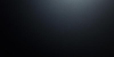 Close-up of a Black, Textured Surface with a Subtle Light Source photo
