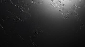 Abstract Dark Textured Surface with Light Source photo