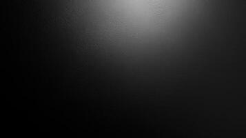 A Dark, Textured Surface with a Single Light Source photo