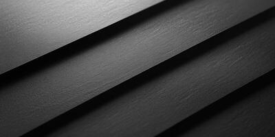 Abstract Close-up of Black Textured Surface with Diagonal Lines photo