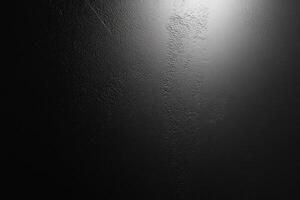 Black Textured Surface with Light Source photo