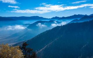 Beautiful mountain scenery on the background of clouds, layers of mountains on the horizon, Sierra Nevada Mountains, California, USA photo
