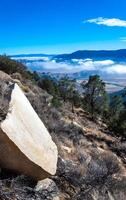 Beautiful mountain scenery on the background of clouds, layers of mountains on the horizon, Sierra Nevada Mountains, California, USA photo