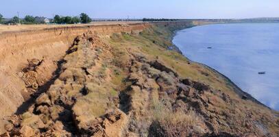 A large landslide on a clay cliff bank in eastern Crimea photo