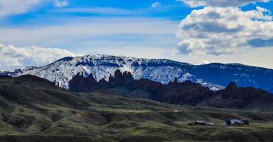 Mountain landscape, snow in the mountains in spring in Montana photo
