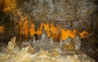 Calcite inlets, stalactites and stalagmites in large underground halls in Carlsbad Caverns National Park, New Mexico. USA photo
