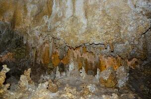 Calcite inlets, stalactites and stalagmites in large underground halls in Carlsbad Caverns National Park, New Mexico. USA photo
