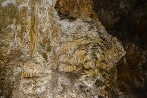 Calcite inlets, stalactites and stalagmites in large underground halls in Carlsbad Caverns National Park, New Mexico. USA photo