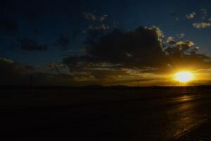 Big cumulus clouds in the evening during sunset in New Mexico photo