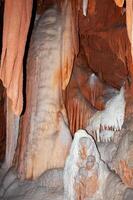 Calcite inlets, stalactites and stalagmites in large underground halls in Carlsbad Caverns NP, New Mexico photo