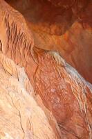 Calcite inlets, stalactites and stalagmites in large underground halls in Carlsbad Caverns NP, New Mexico photo