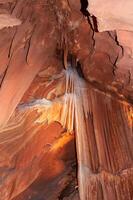 Calcite inlets, stalactites and stalagmites in large underground halls in Carlsbad Caverns NP, New Mexico photo