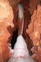 Calcite inlets, stalactites and stalagmites in large underground halls in Carlsbad Caverns NP, New Mexico photo