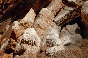 Calcite inlets, stalactites and stalagmites in large underground halls in Carlsbad Caverns NP, New Mexico photo