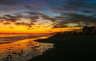 Red sunset over Brighton Beach, New York, USA. photo