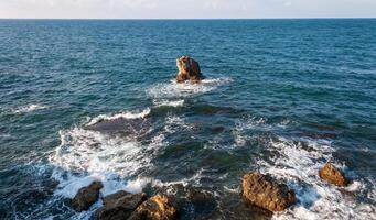 High limestone coastal cliffs against the backdrop of the Black Sea on Tarkhankut, Atlesh, western Crimea photo