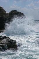 Severe storm at sea near the coastal cliffs in the Black Sea on Tarkhankut, Atlesh, western Crimea photo