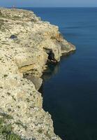 Coastal limestone cliffs on Atlesh in Crimea, Tarkhankut photo
