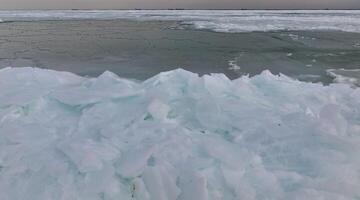 Coastal cliffs and coastal protection structures frozen with ice in the cold winter of 2010, the Black Sea photo