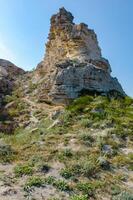 Rocks and stones of the Dzhangul landslide coast in the western Crimea, Tarkhankut photo