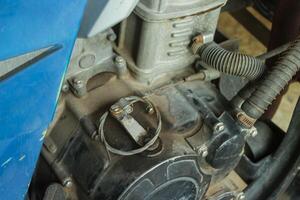 Dirty vehicle engine components due to late engine oil changes photo