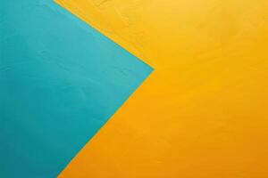 Vibrant geometric abstract of teal and golden yellow textures on a vibrant wall in midday light photo