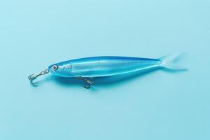 A vibrant blue fishing lure on a light turquoise background, showcasing its sleek design and realistic details for a successful catch photo