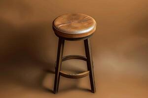 A rustic wooden stool with a plush leather seat against a warm, earthy backdrop in soft evening light photo