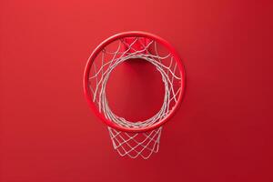 A vibrant basketball hoop against a bold red wall, inviting play and competition in an indoor sports setting photo