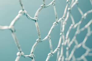 Delicate mesh of intertwined fibers against a soft blue backdrop capturing the essence of structure and light photo