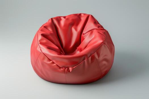 A vibrant red bean bag chair inviting relaxation in a minimalist setting photo
