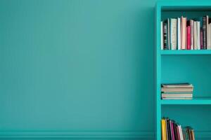 A vibrant turquoise wall enhances a stylish bookshelf filled with an array of colorful books in a modern living space photo