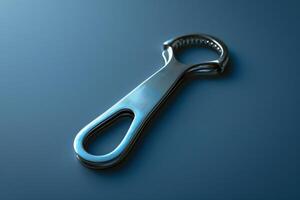 A sleek metal bottle opener resting on a smooth blue surface, catching the light in an artistic arrangement that highlights its functional design photo