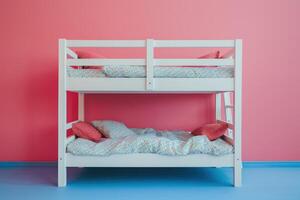 Cozy bunk beds nestled against a vibrant pink wall in a playful child's room during daylight photo