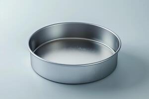 Sleek silver baking pan on a soft blue background perfect for culinary creations in a modern kitchen photo