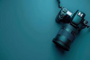 A sleek DSLR camera with a large lens, resting on a vibrant blue surface, capturing creativity and inspiration in an artistic setting photo