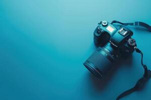 A beautifully illuminated camera resting on a soft blue surface, ready to capture moments at dusk in a tranquil environment photo