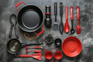 A vibrant collection of cooking utensils arranged artistically on a textured surface photo