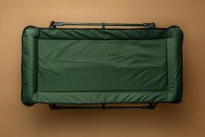 Comfortable portable cot resting on a warm-toned background, perfect for camping or guest accommodations photo