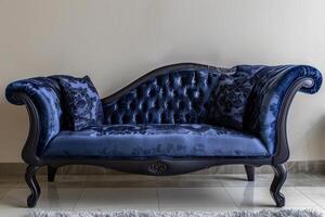 Elegant blue velvet sofa with ornate detailing in a bright, modern living room photo