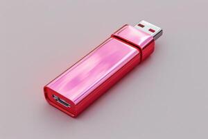 A shiny pink USB flash drive on a smooth surface with a clean design photo