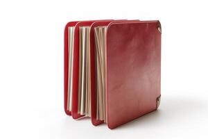 A red binder filled with blank sheets on a white background photo