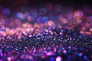 Colorful bokeh lights create a shimmering background with purple and gold tones photo