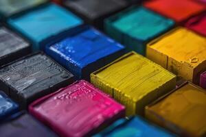 Vibrant colors of assorted square chalk pastels arranged on a workspace photo