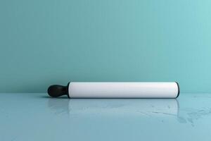 A lint roller rests on a glossy surface against a soft blue wall in a well-lit room photo