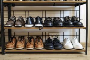 Organization of various footwear on shelving in a modern room photo