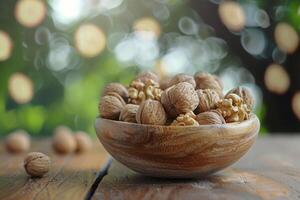A wooden bowl filled with walnuts sits on a rustic table surrounded by a blurred natural background in soft daylight photo